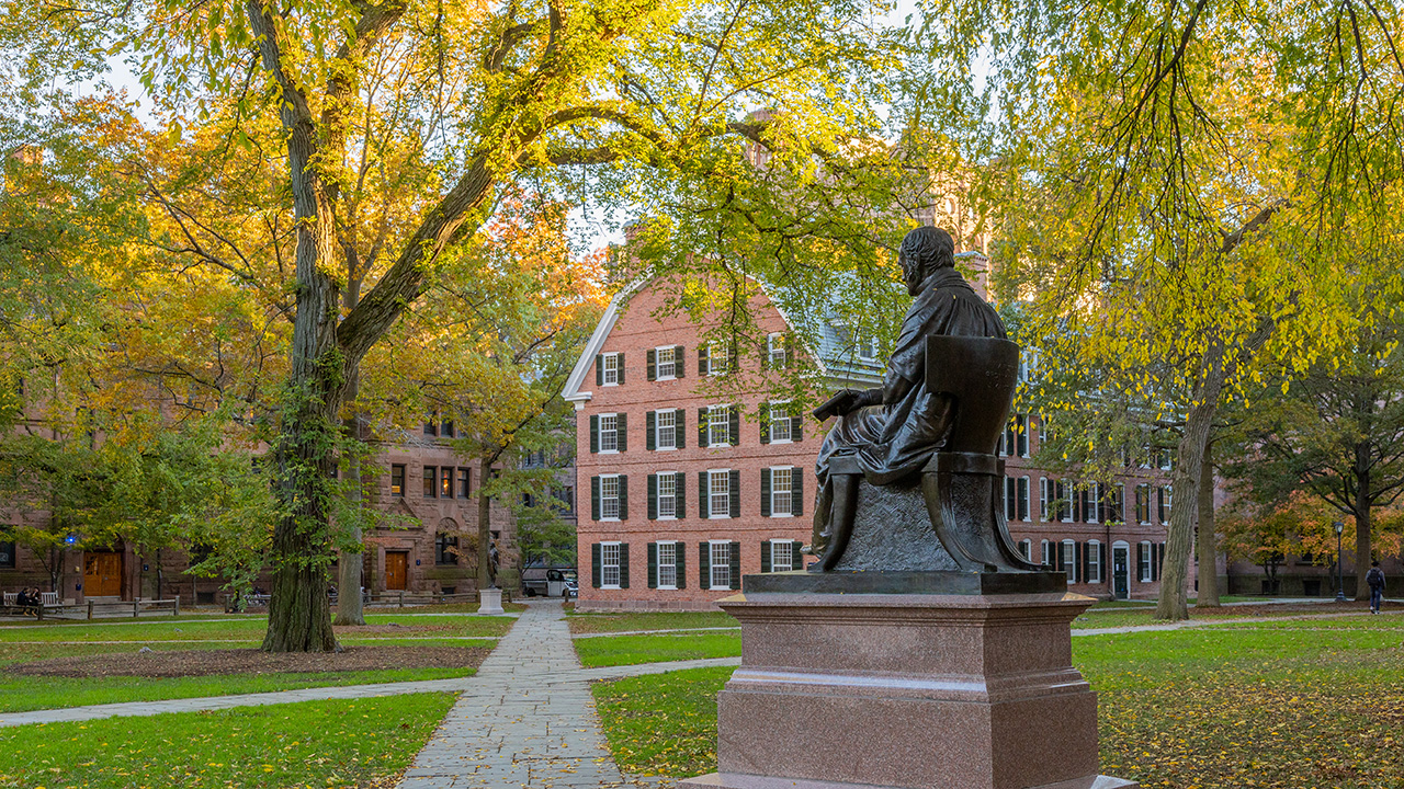 Theodore Dwight Woolsey Statue on Old Campus with Connecticut Hall in the background