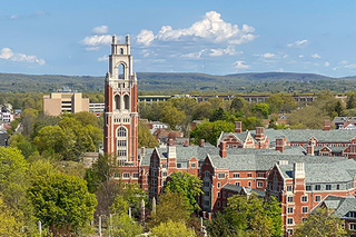 Bass Tower and Pauli Murray College buildings with horizon line in background