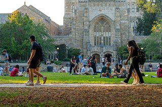 Student walking on Cross Campus