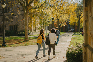 Students walking through cross campus
